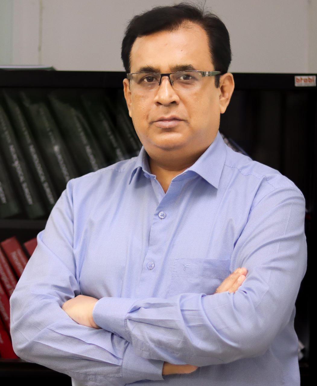 Neurosurgeon in Bangladesh — Prof. Dr. Moklasur Rahman Mukul Professional portrait of Prof. Dr. Moklasur Rahman Mukul in a clinical setting.