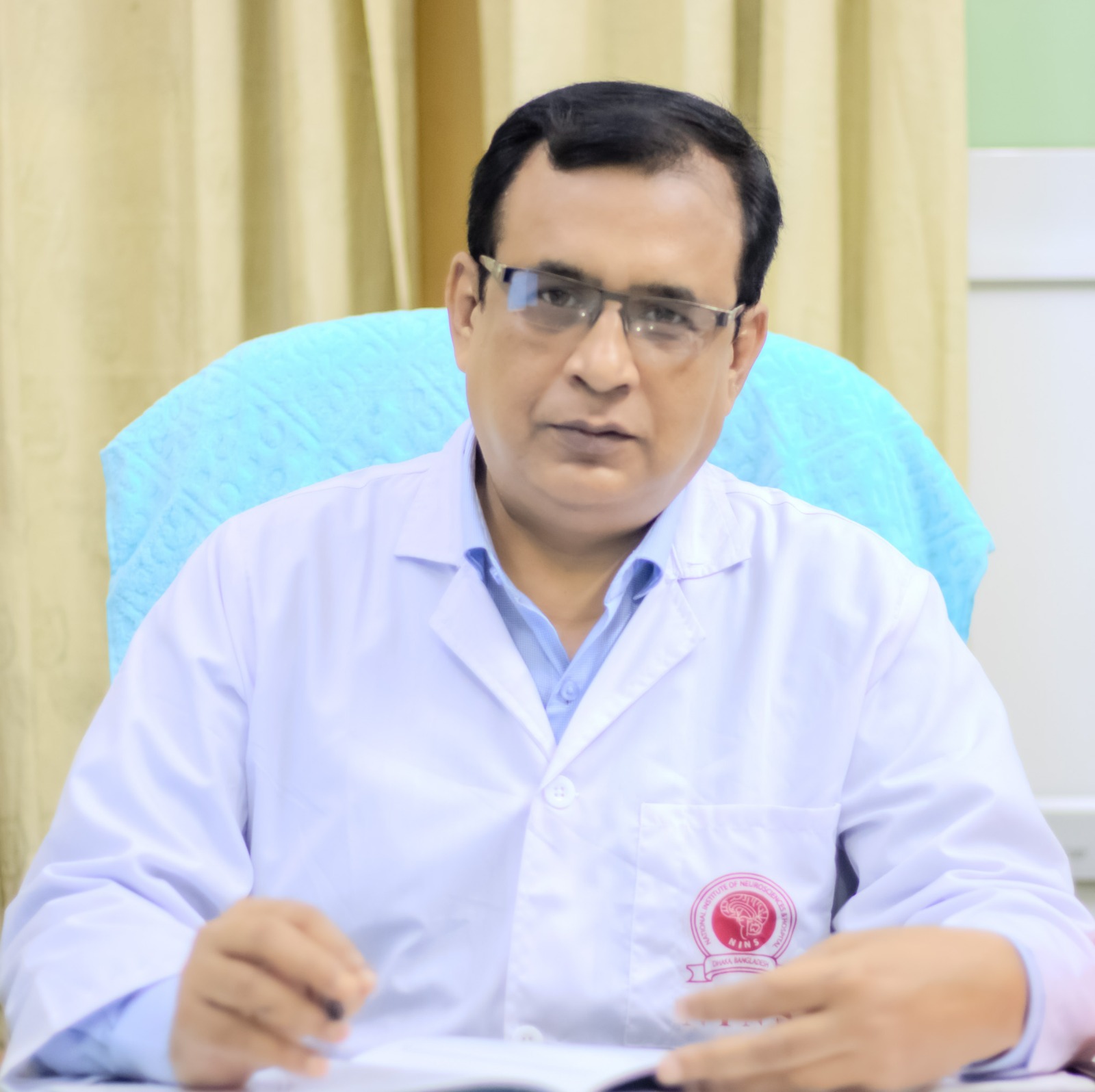 Neurosurgeon in Bangladesh — Prof. Dr. Moklasur Rahman Mukul Professional portrait of Prof. Dr. Moklasur Rahman Mukul in a clinical setting.