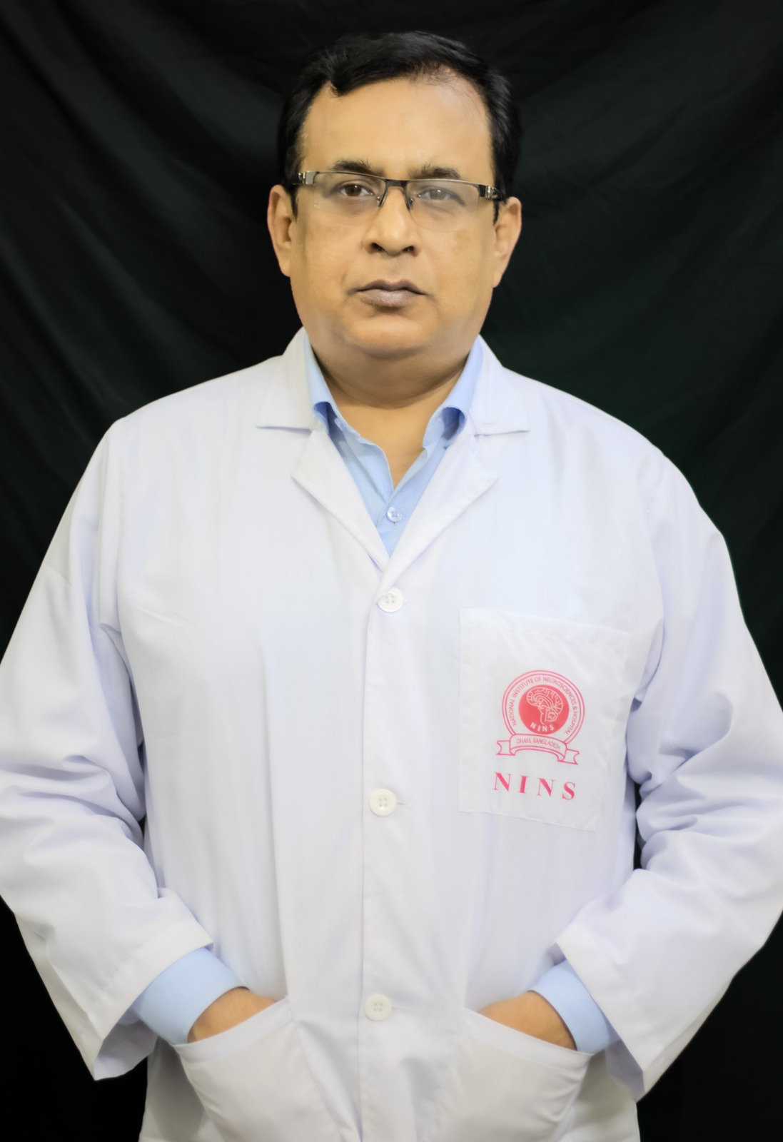 Neurosurgeon in Bangladesh — Prof. Dr. Moklasur Rahman Mukul Professional portrait of Prof. Dr. Moklasur Rahman Mukul in a clinical setting.